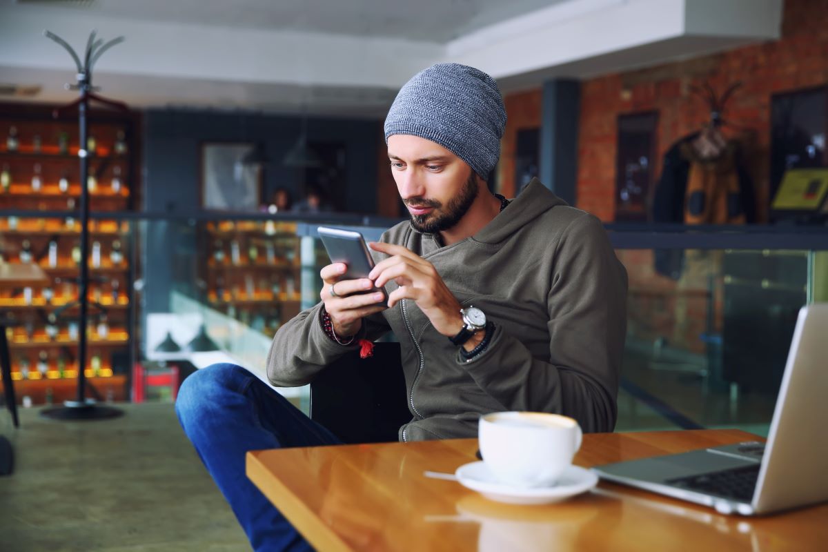 young-handsome-hipster-man-with-beard-sitting-in-coffee.jpg